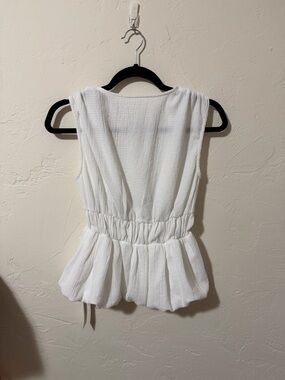 Commense White Sleeveless Peplum Camisole